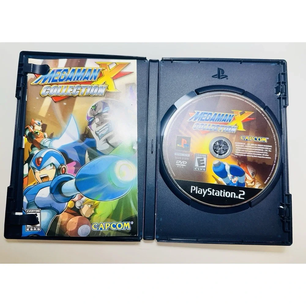 Lot 4 DVD PlayStation 2 Megaman, MVP Baseball 2004, SpongeBob, Grand Theft Auto
